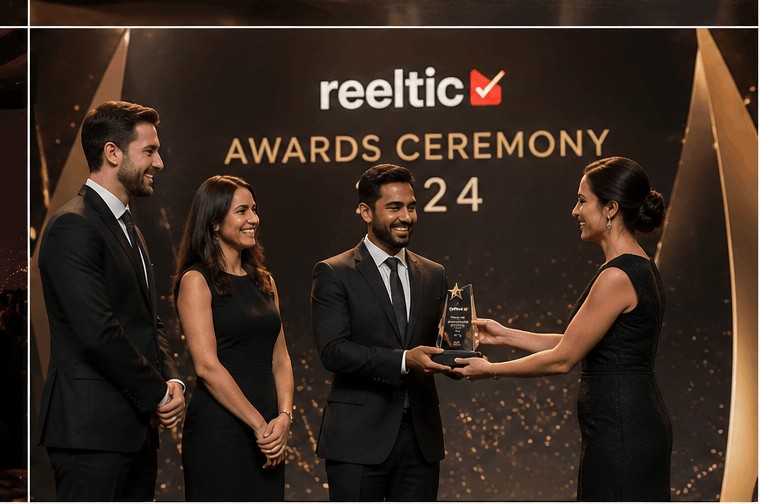 A winner receiving a Reeltic award on stage